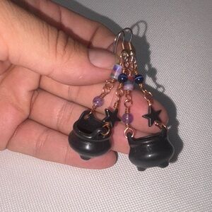 Black Cauldron Earrings with Purple Accents